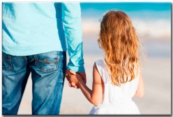 Father and daughter holding hands